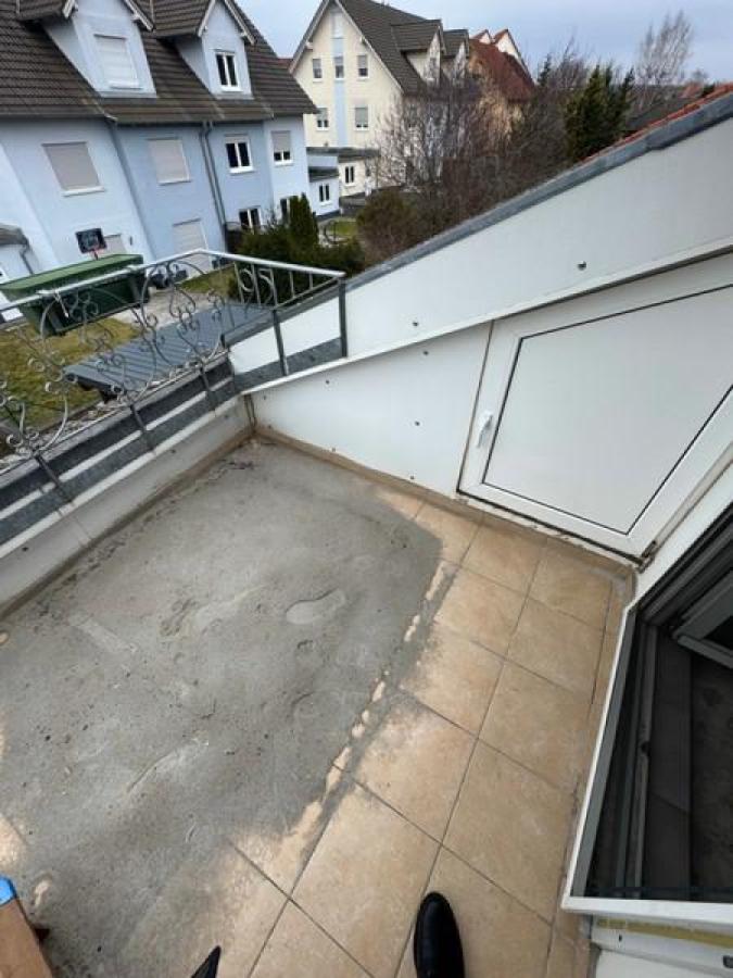 23 Balkon mit Sandkasten
