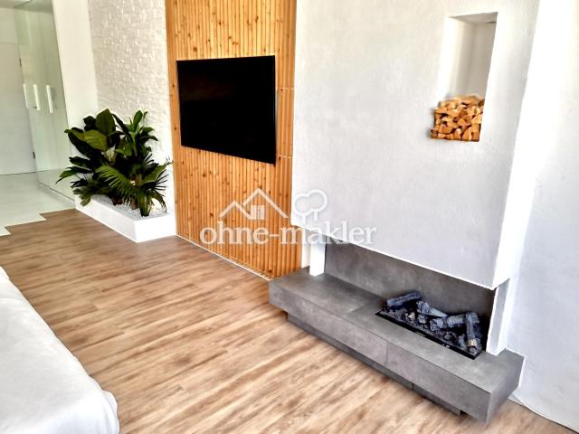 Flatscreen & Ambient Kamin