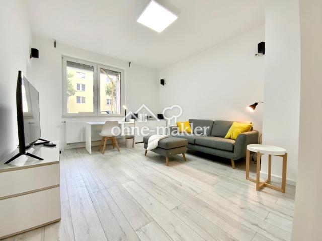 Wohnzimmer - hochw. Laminat