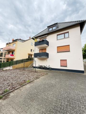 Hausrückseite mit Balkon EG (1)