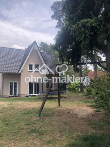 Hausansicht mit Schaukel