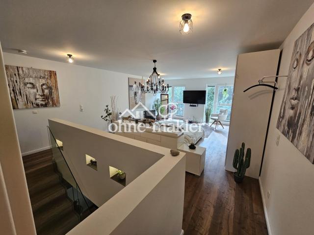 Blick ins loftartige Schlafzim