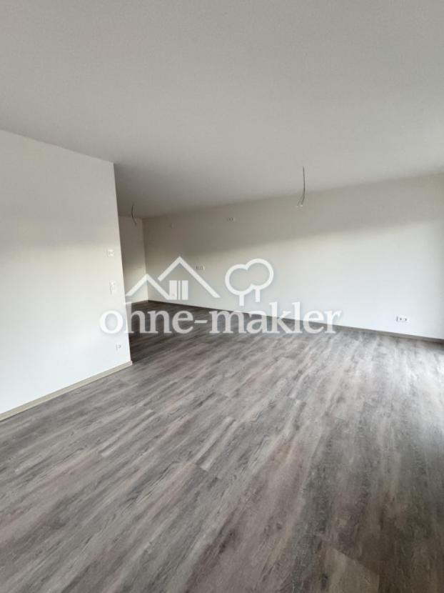 Wohnzimmer mit offener Küche