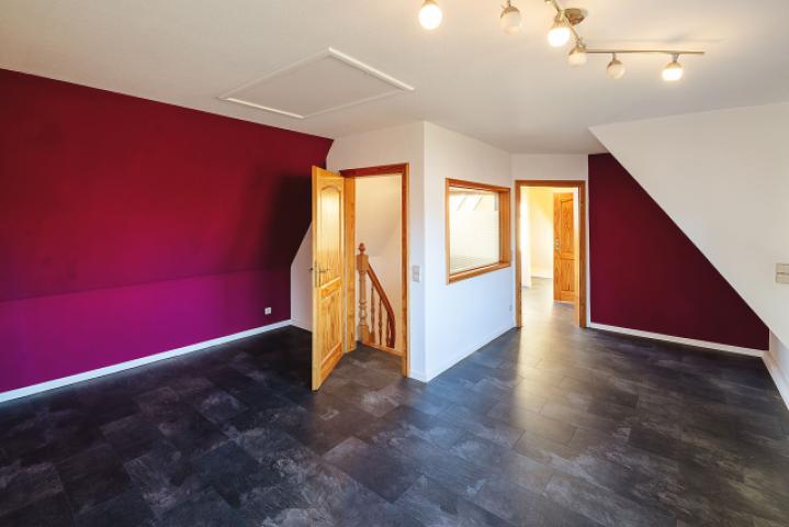 Wohnbereich oder Arbeitszimmer im Dachgeschoss