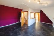 Wohnbereich oder Arbeitszimmer im Dachgeschoss