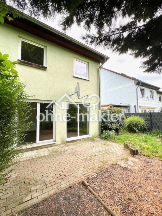 Terrasse + Hausansicht hinten