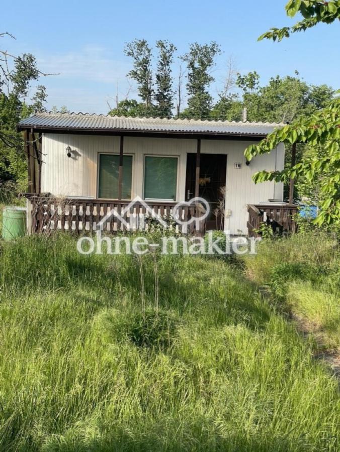 Gartenhaus + Grundstück