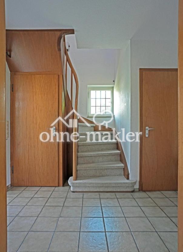 Treppe mit Aufgang ins Oberges