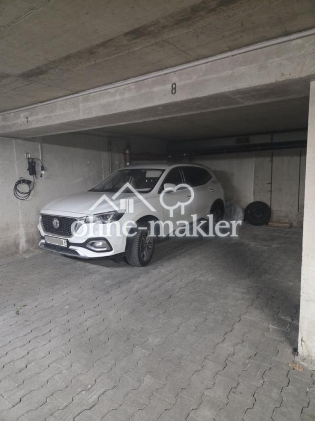 Tiefgaragenplatz + Ladestation