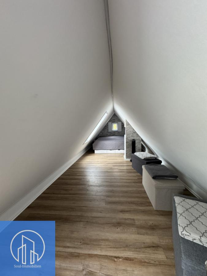 Ferienhaus WO4 Dachgeschoss Schlaffzimmer (1)