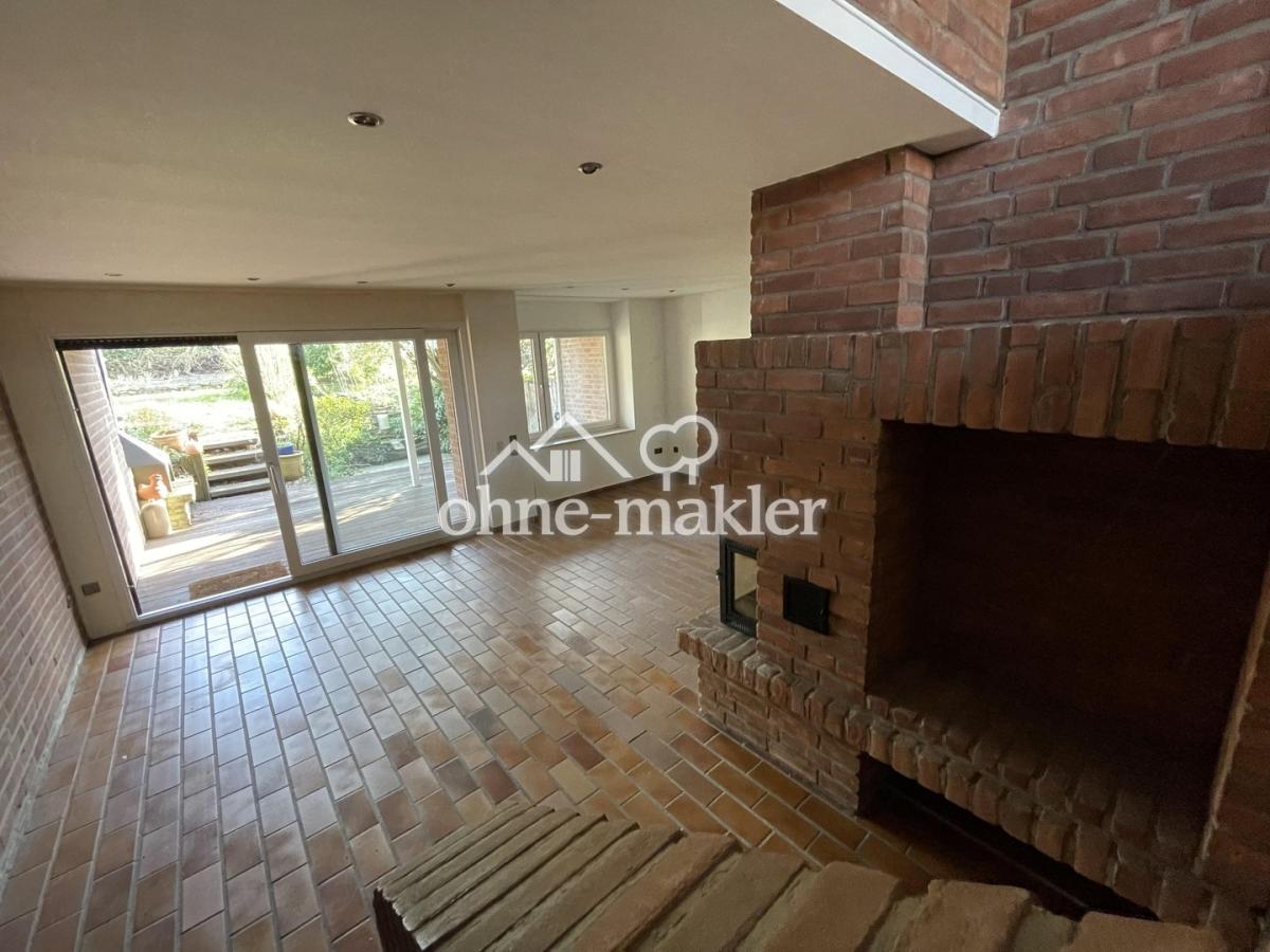 Wohnzimmer mit Kamin