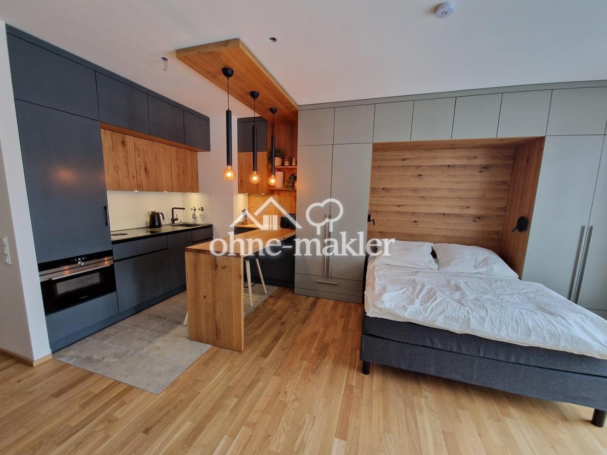 Einbauküche und Bett