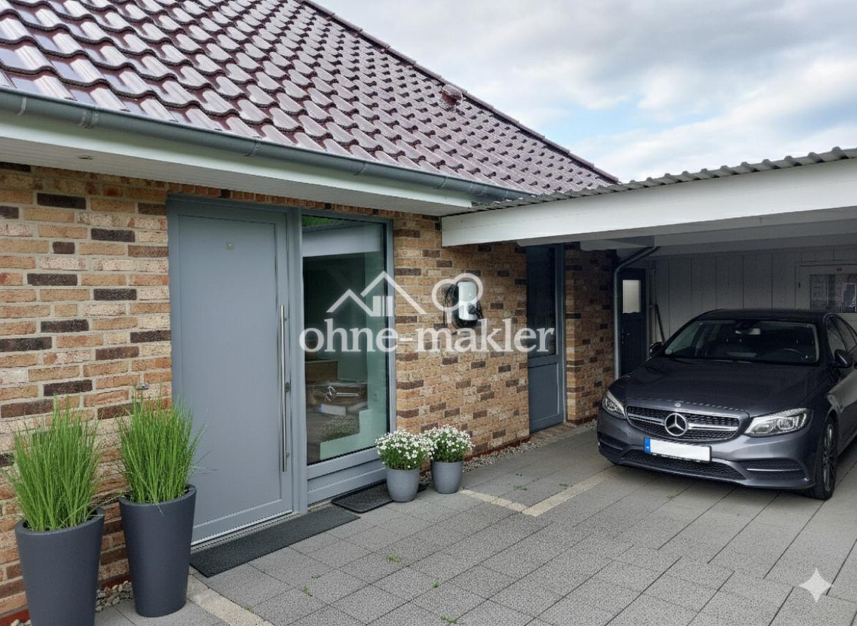 Carport mit Wallbox und Zugang
