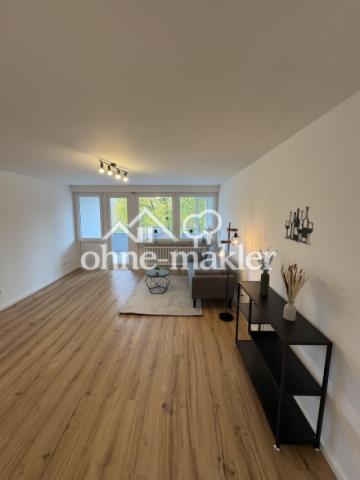 Wohnzimmer + Südbalkon