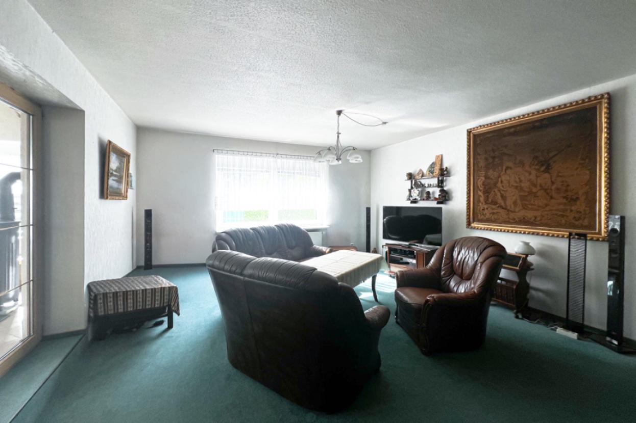 Wohnzimmer mit Wintergarten