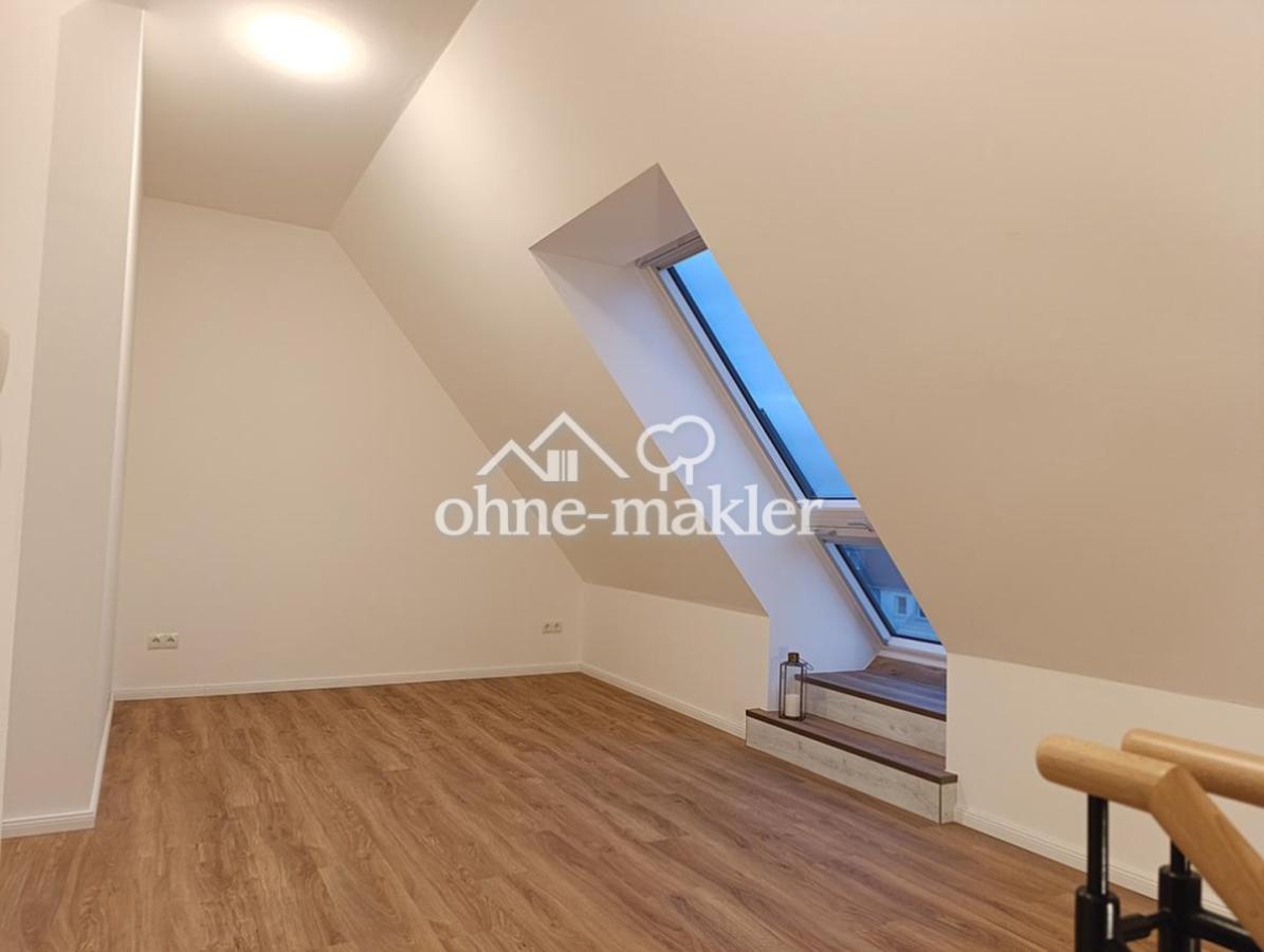 Schlafebene mit Fensterbalkon