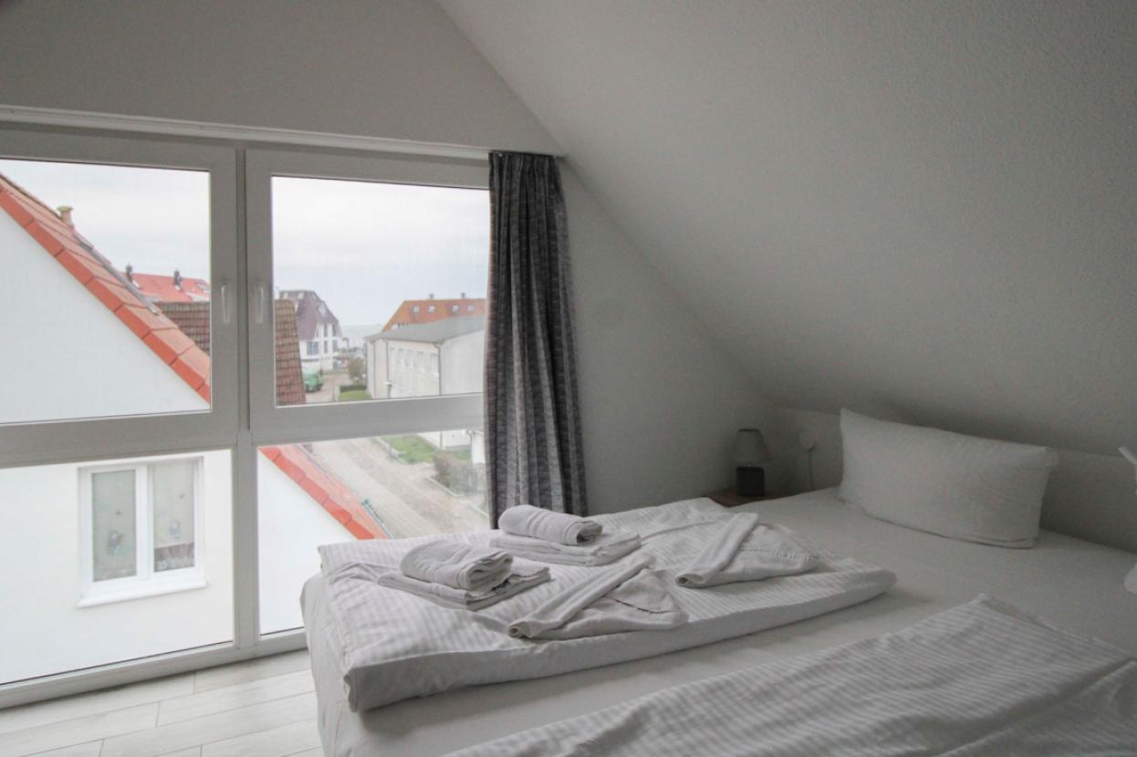 Schlafzimmer mit Hafenblick