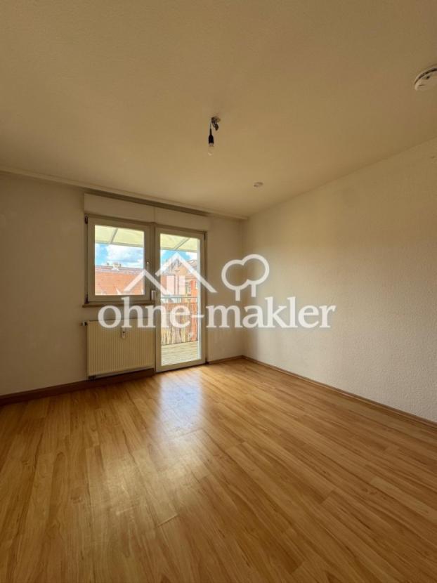 Schlafzimmer mit Balkonzugang