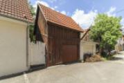 Eingang mit Schuppen + Garage