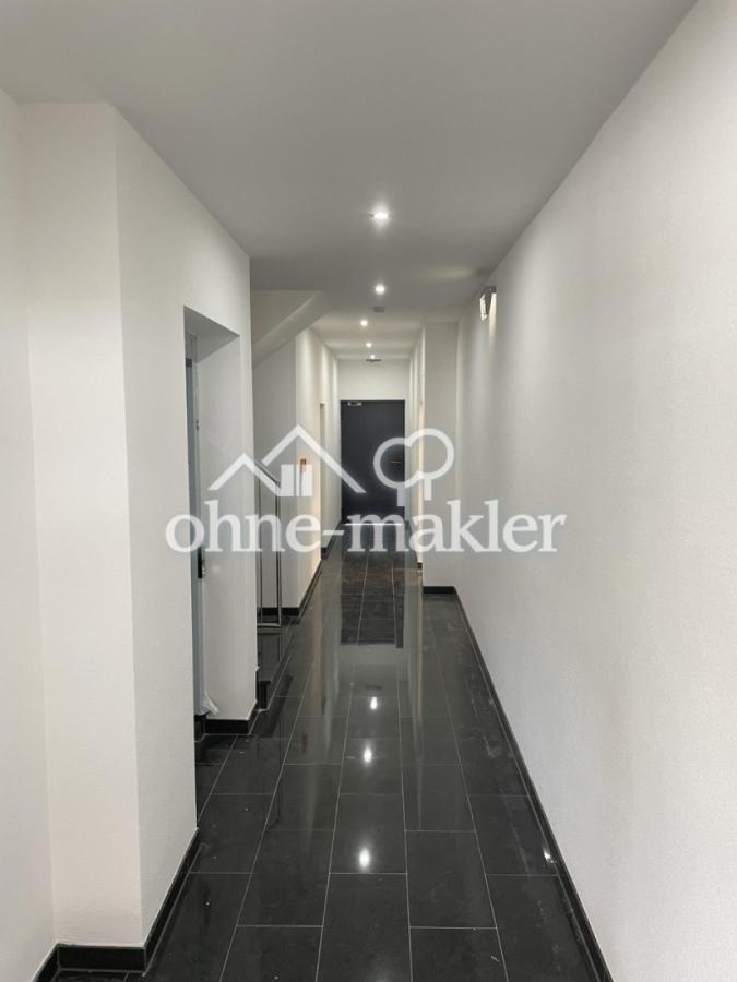 Flur EG Eingang zum Aufzug