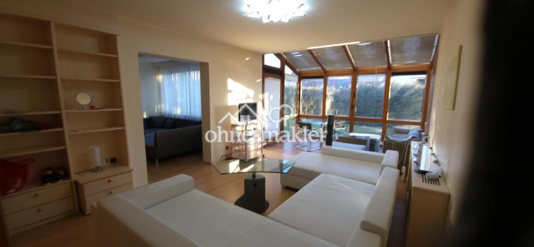 Wohnzimmer mit Wintergarten