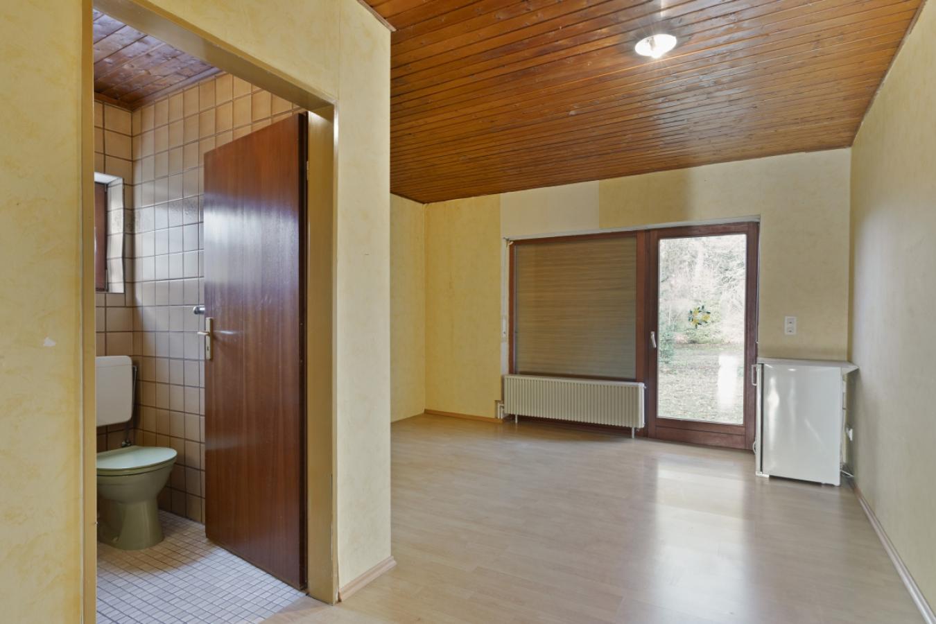 Zimmer EG mit barrierefreiem Gartenzugang