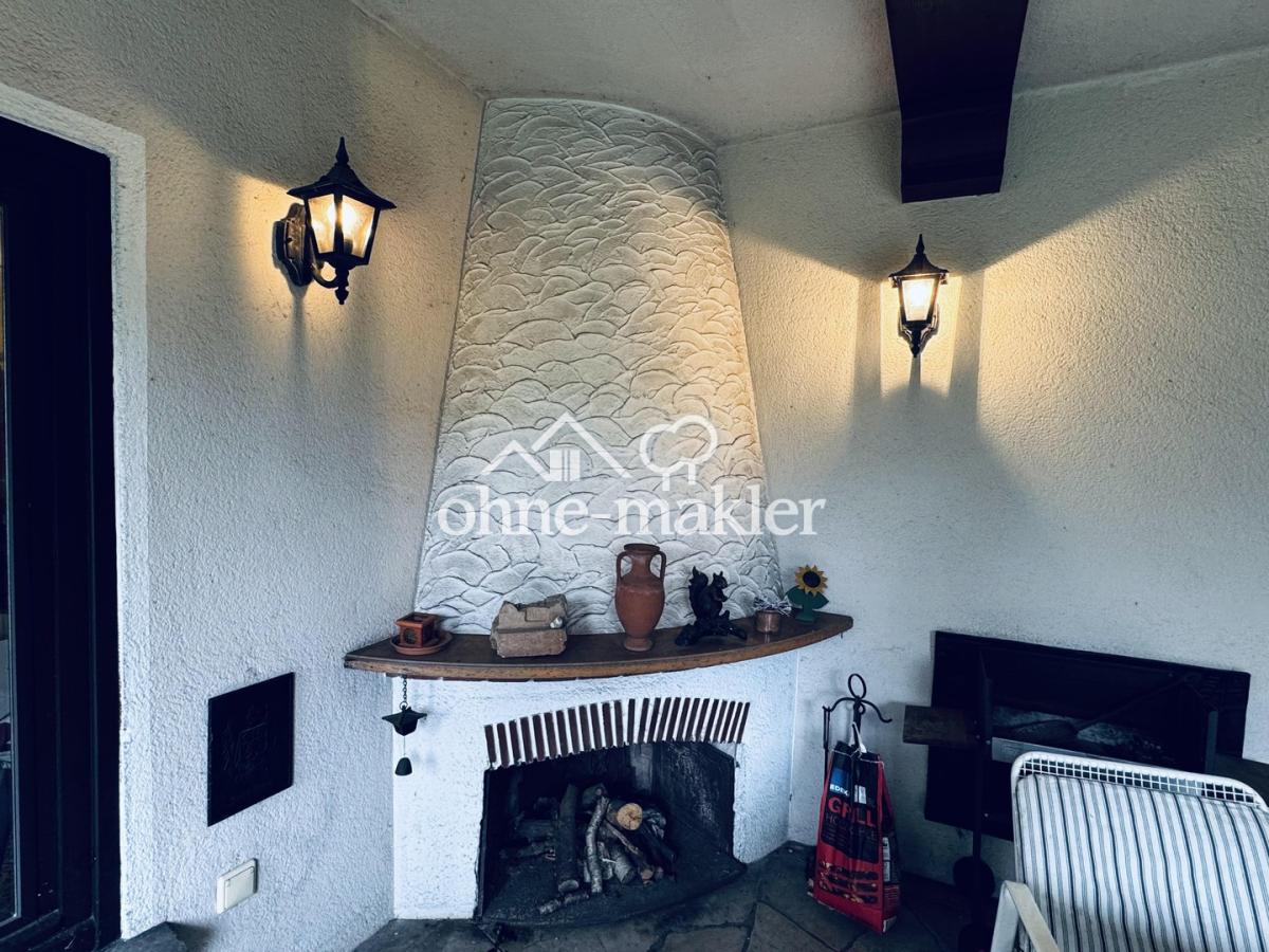 Kamin bei überdachter Terrasse