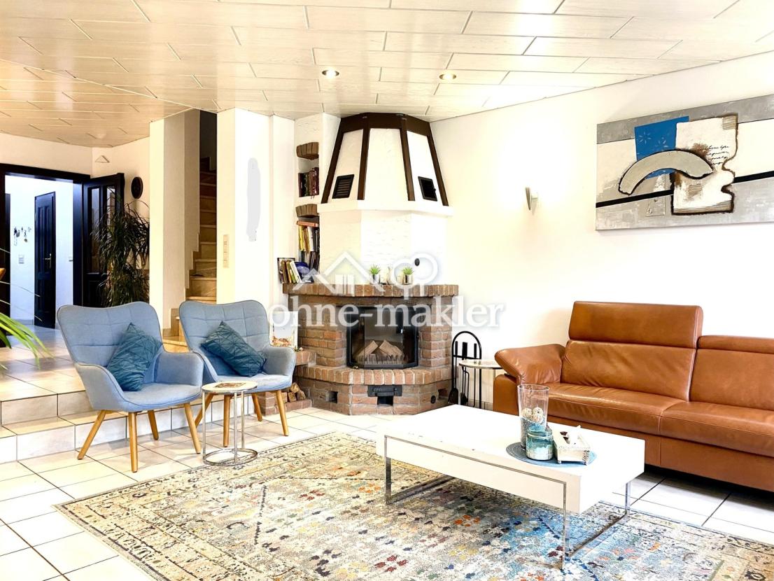 Wohnzimmer mit Kamin