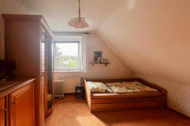 Kleines Schlafzimmer im OG