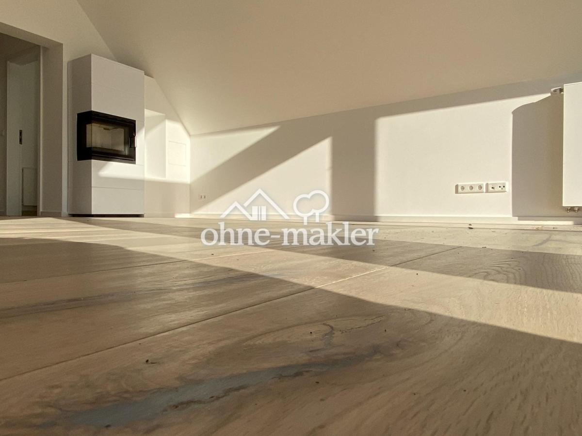 Wohnzimmer mit Kamin