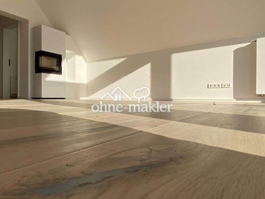 Wohnzimmer mit Kamin