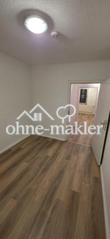 Blick aus Zimmer 1 zum Wohnzim