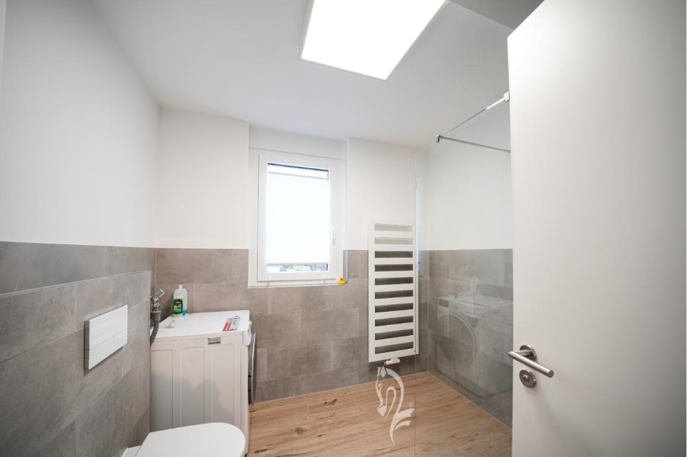 Bad mit bodentiefer Dusche