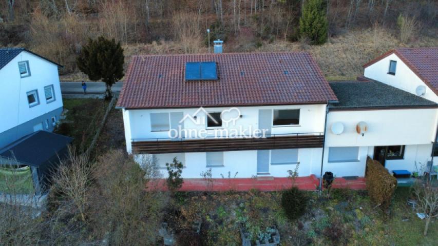 Rückseite mit einem Gartenteil