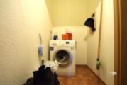 Abstellraum mit Waschmaschinenanschluss