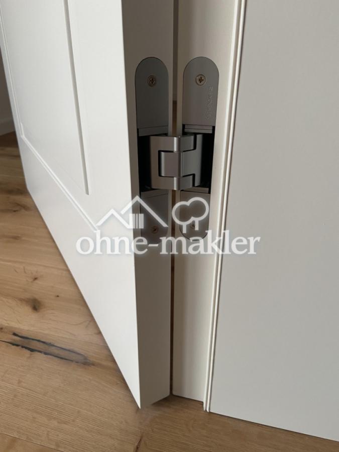 Innenliegende Türscharniere