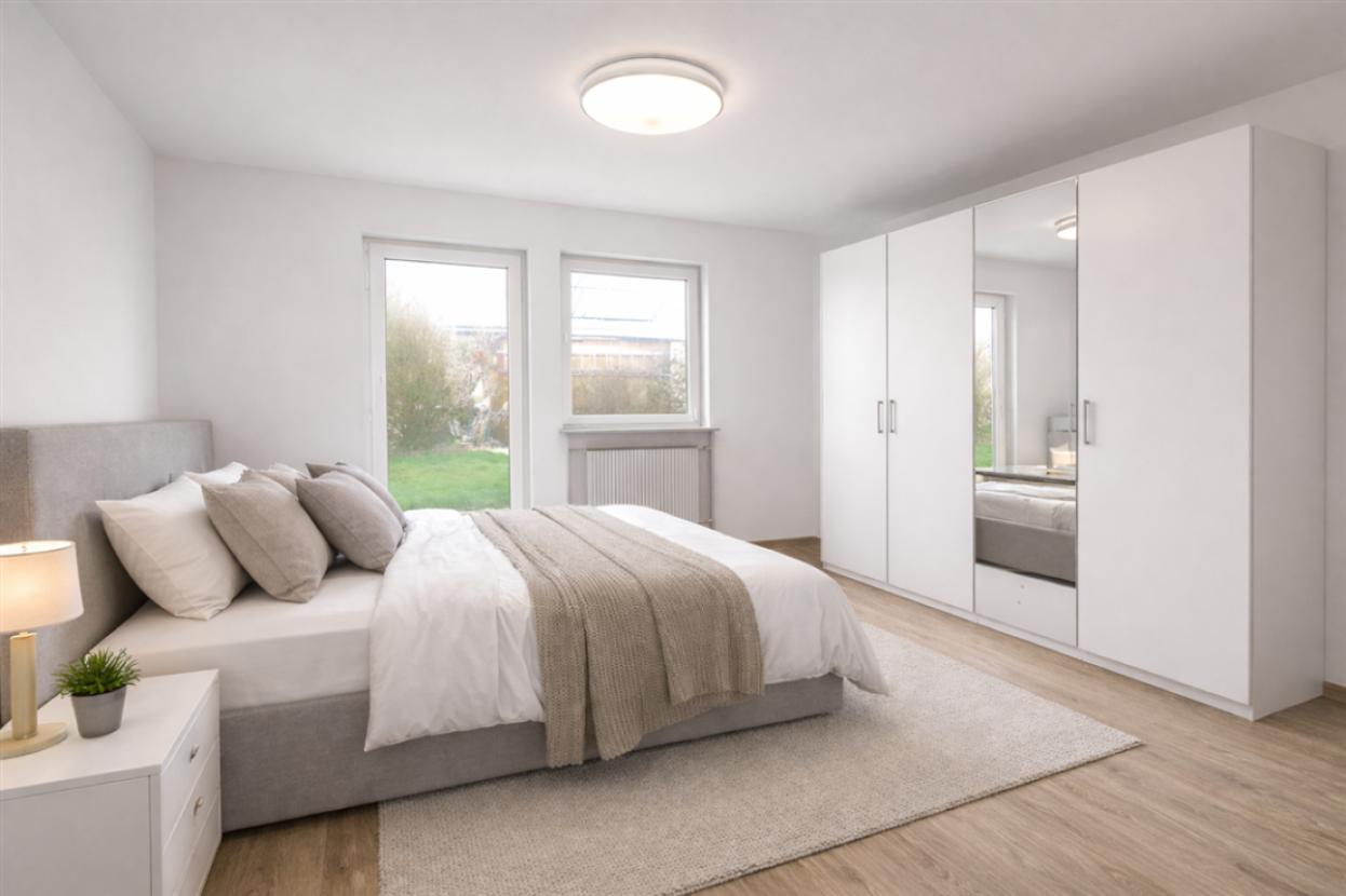 Modernes Schlafzimmer mit Zugang in den Garten