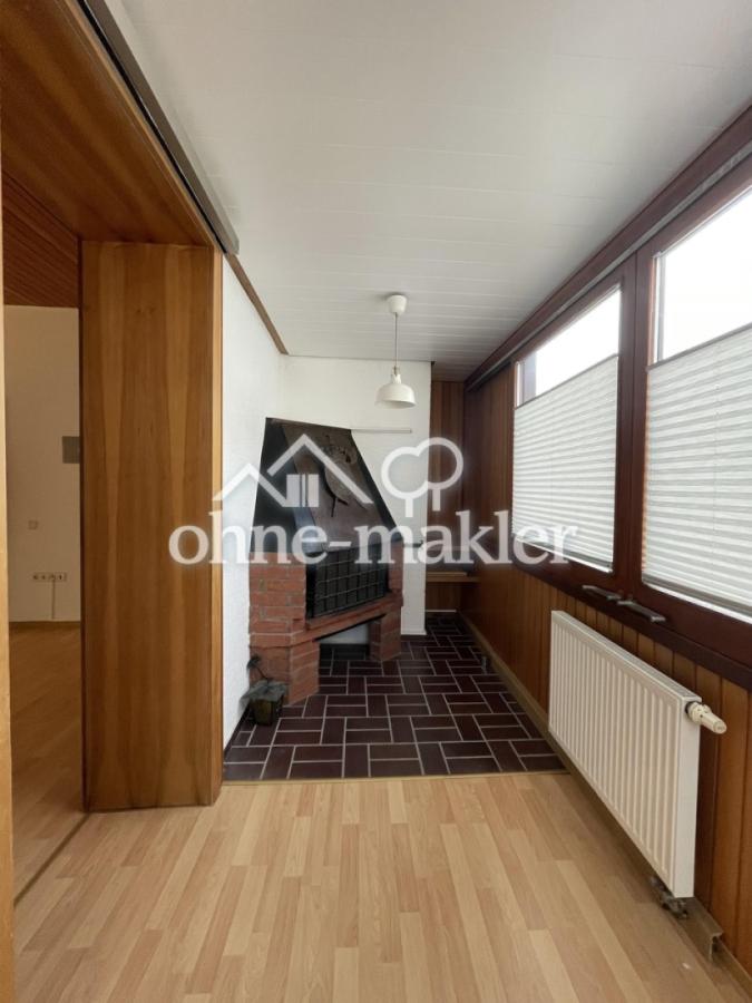 Wintergarten mit Kamin