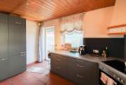 Küche mit Ausgang zur Terrasse