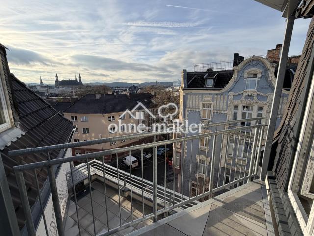 Balkon mit Blick aufs Rathaus