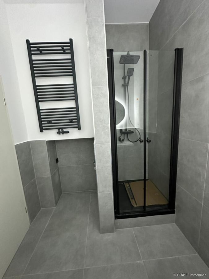 Mit ebenerdiger Dusche