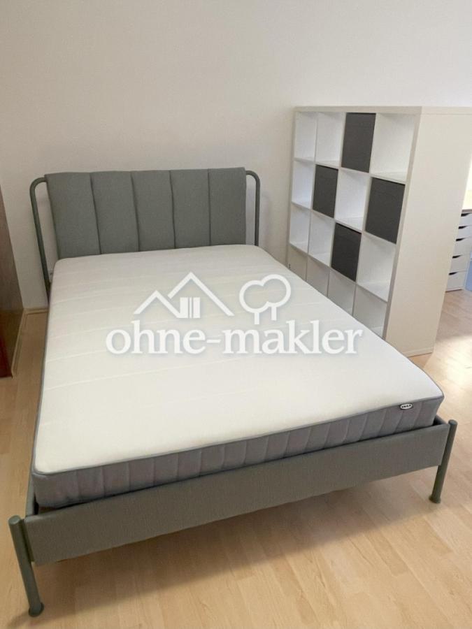 Schlafbereich mit Raumteiler