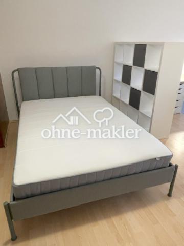 Schlafbereich mit Raumteiler