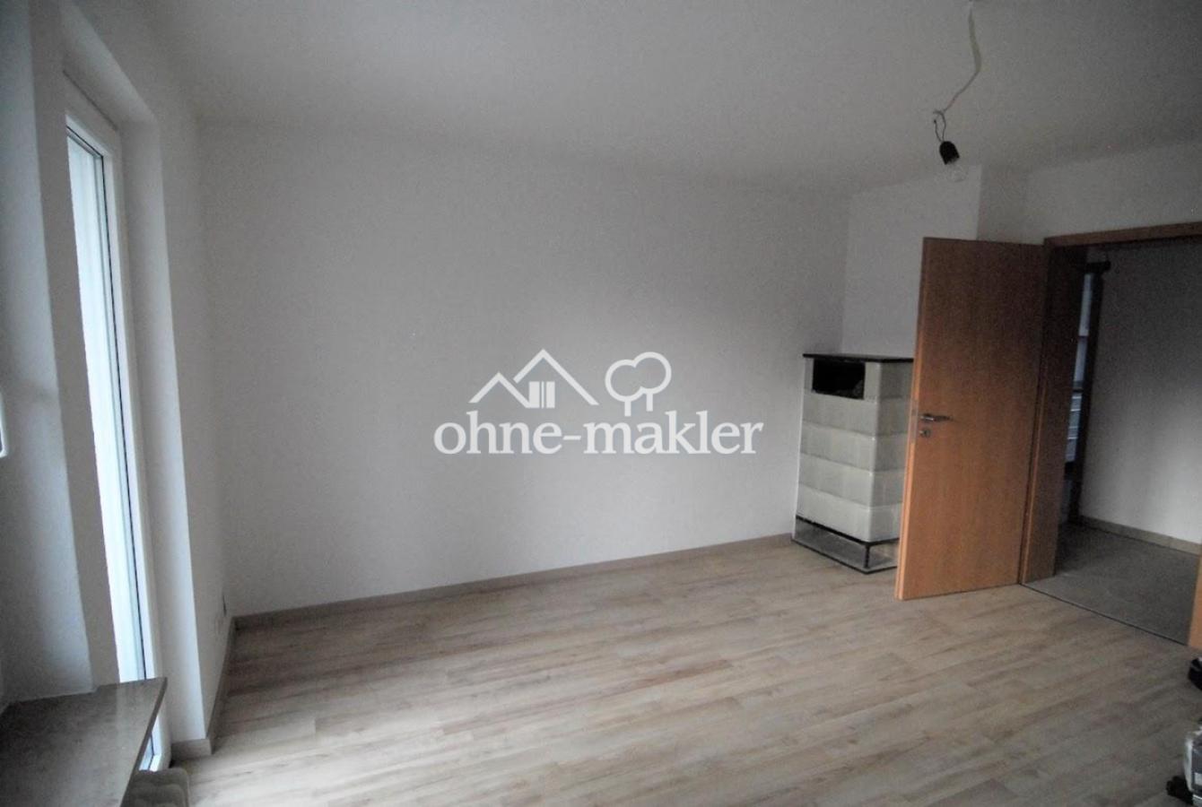 Wohnzimmer mit Kachelofen