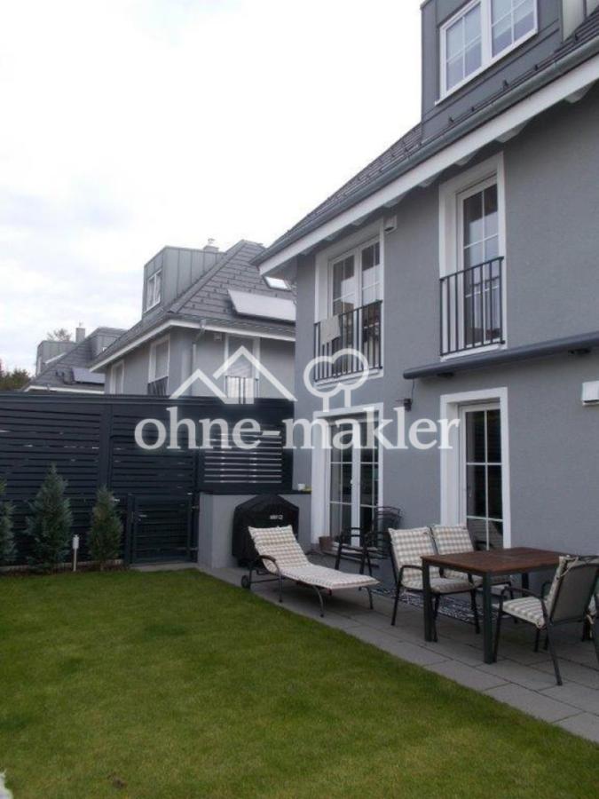 Doppelcarport Haus-Terrasse