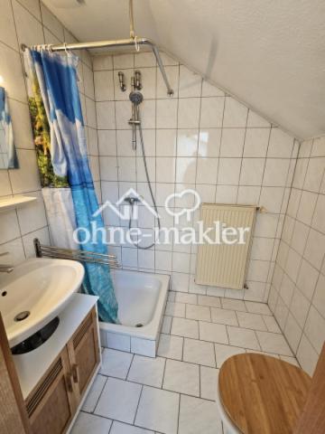 Bad mit Dusche und WC