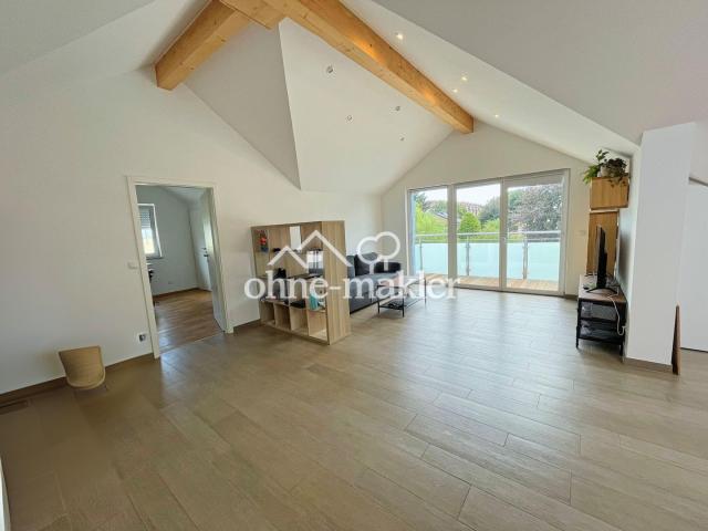 Wohnzimmer große Südverglasung