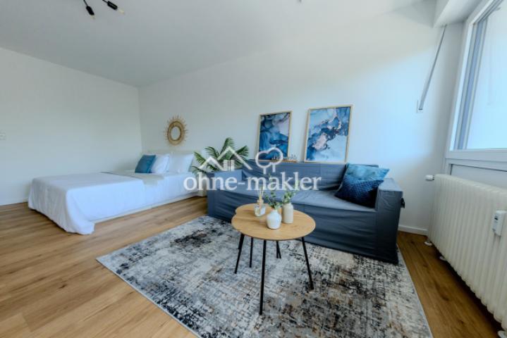 Wohnbereich mit Bett