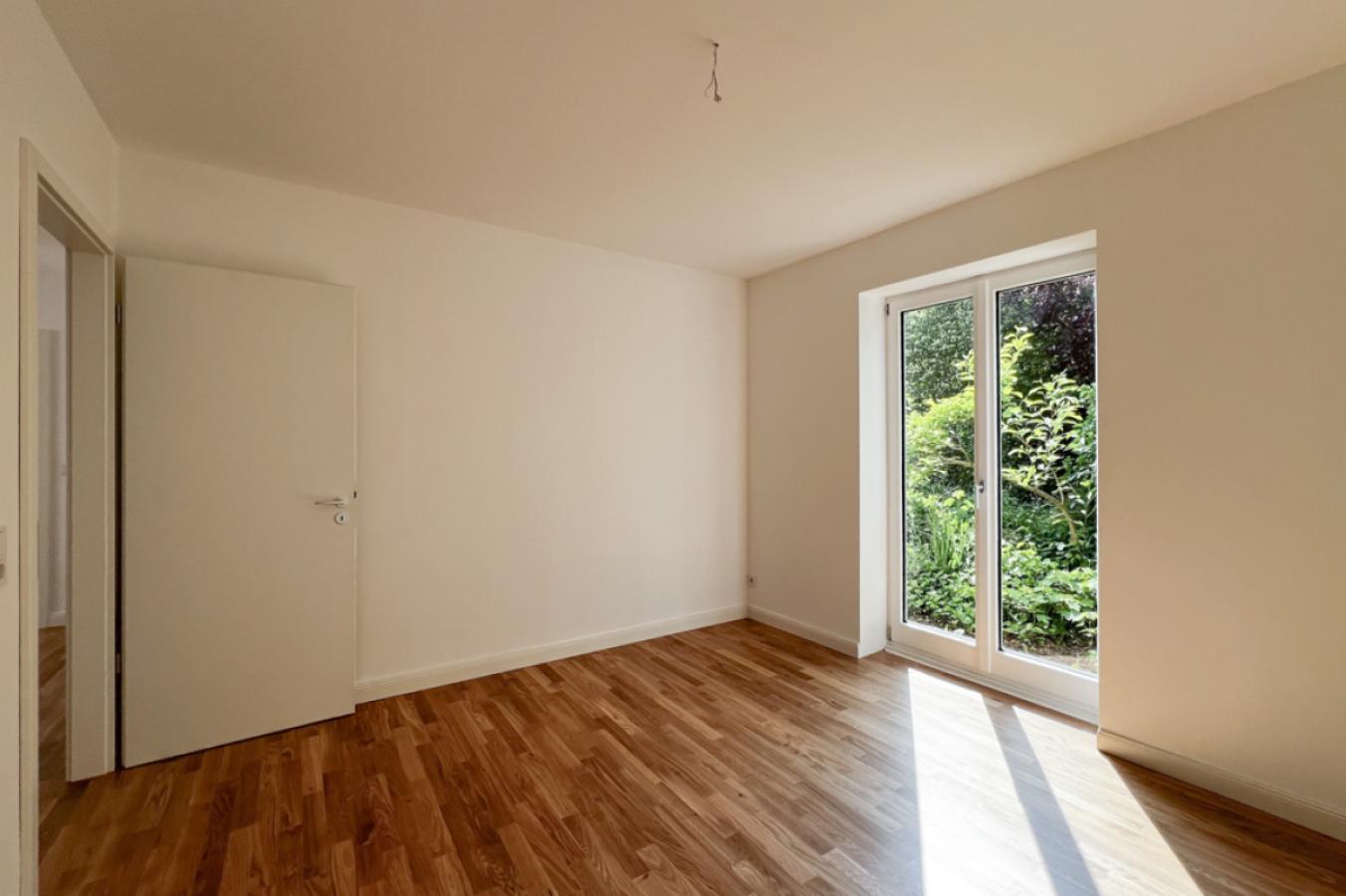 Schlafzimmer mit Gartenblick