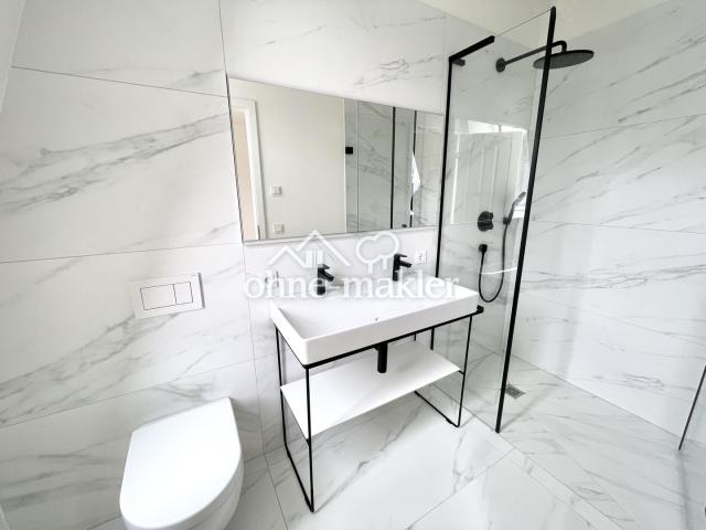 Bad mit bodengleicher Dusche